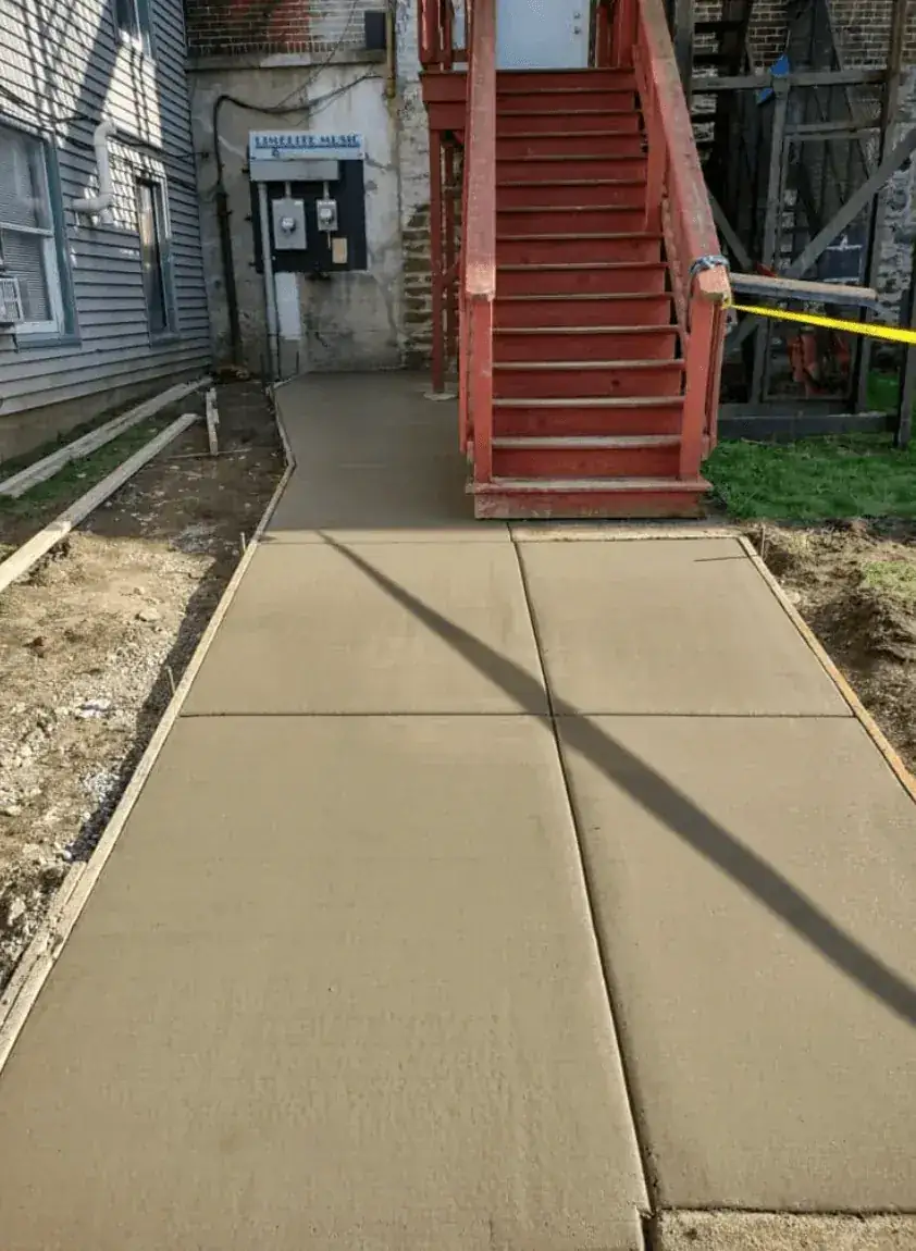 Commercial concrete sidewalk poured for Limelight Music in East Aurora NY by Liberty Pour Concrete